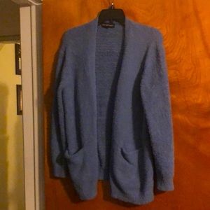 Light blue sweater size small. Never worn